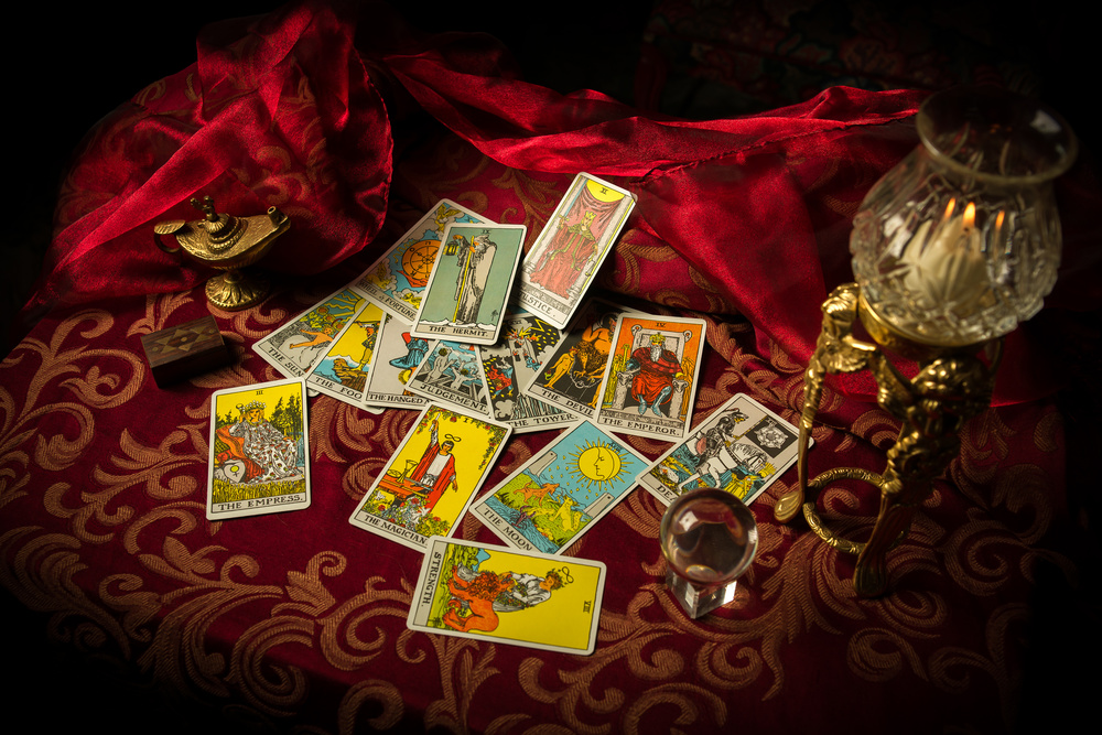 Tarot Cards Spread and scattered on Table Haphazardly
